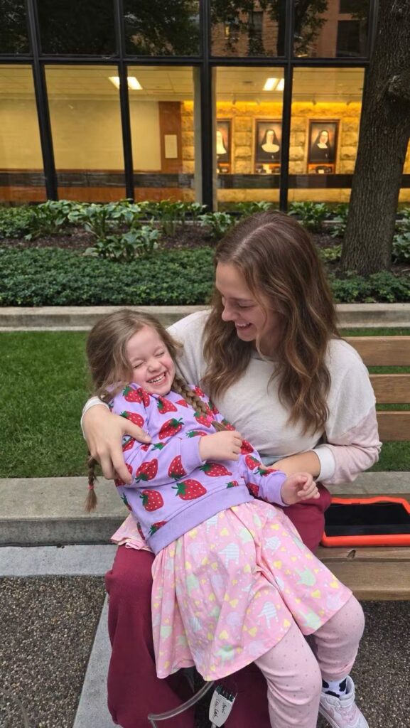 Evelyn and Mom giggling outside