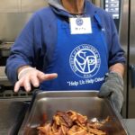 Marc volunteering at St. Vincent de Paul homeless shelter in Oakland, CA