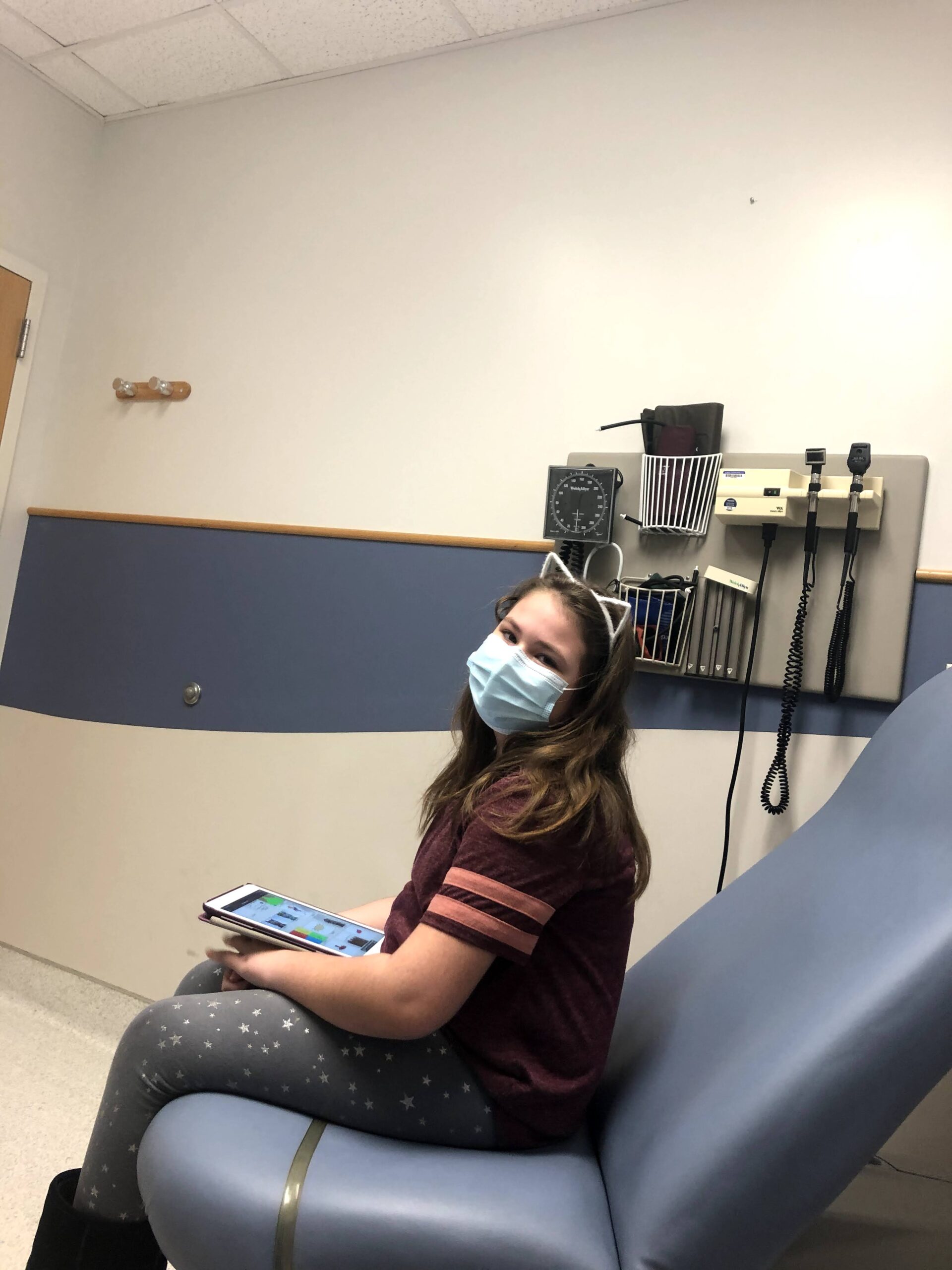 Lydia waiting for labs and a check up at Riley