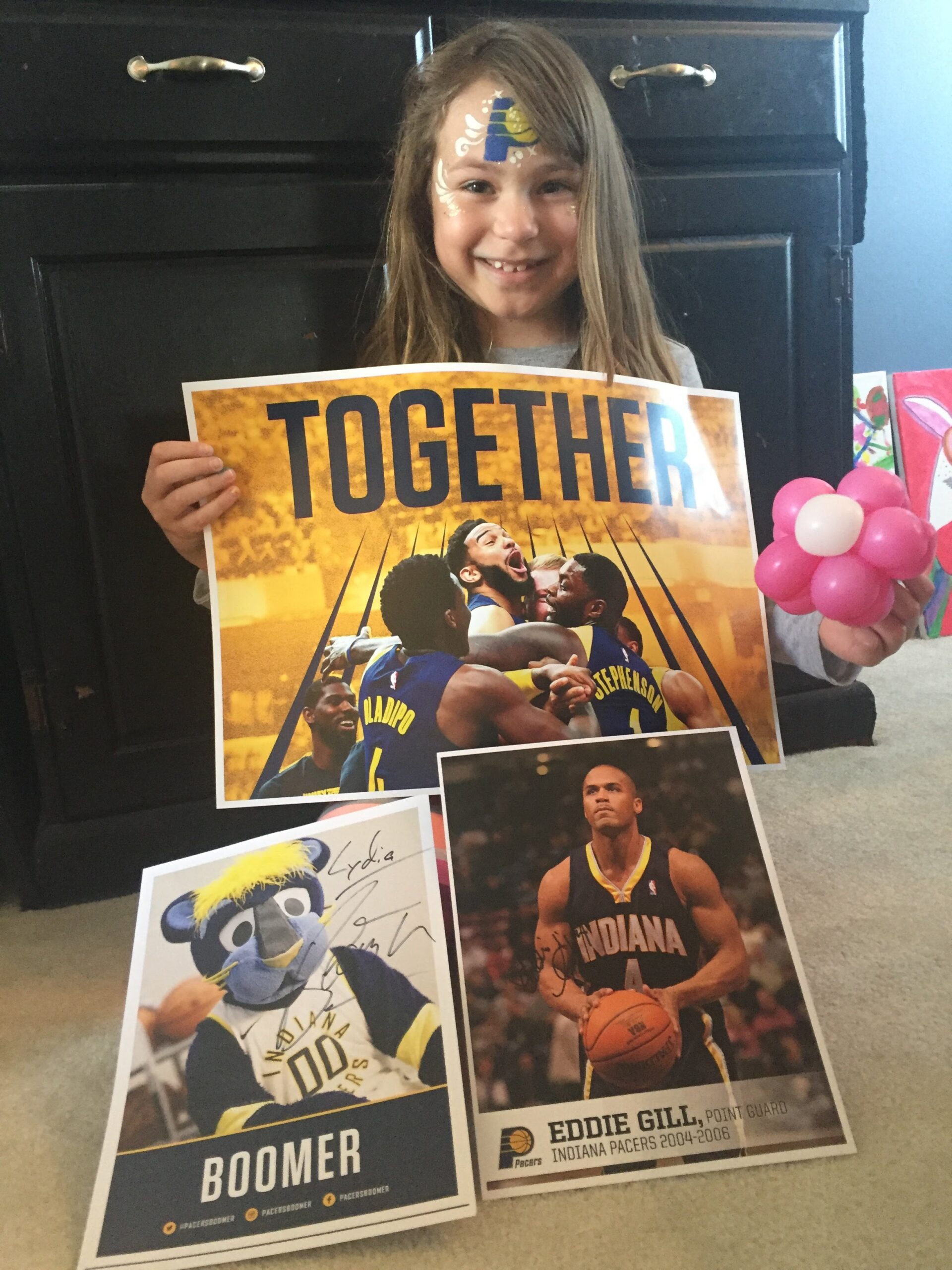 Lydia after meeting some Pacers and dancing with boomer at Kroger