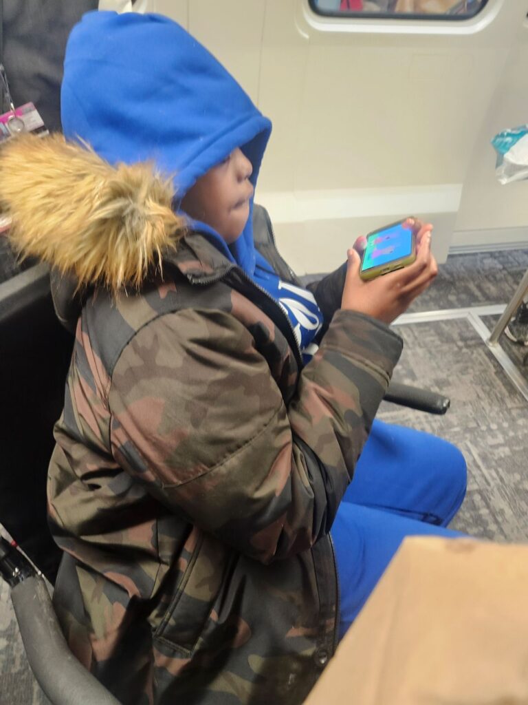 TJ on the flight from Charlotte to Cincinnati to begin his fight